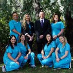 Group photo of the Dr. Sidal and the staff.
